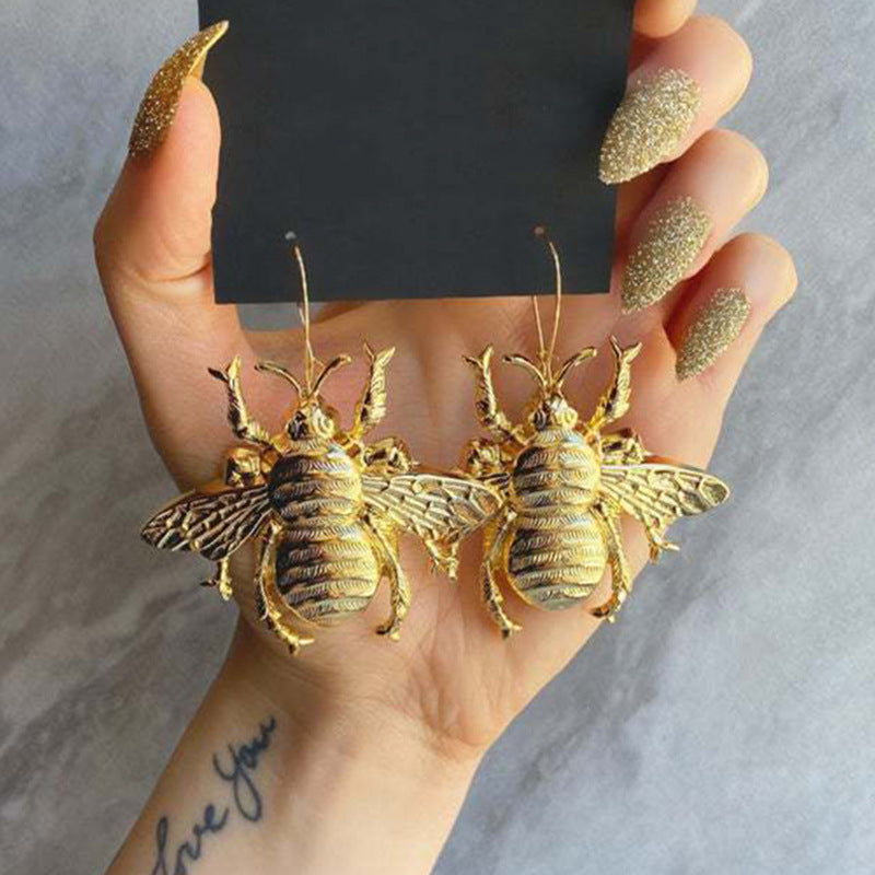 The Queen Buzz Gold Bee Statement Earrings