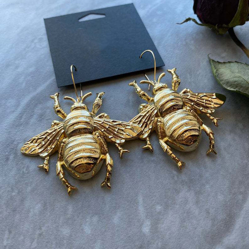 The Queen Buzz Gold Bee Statement Earrings