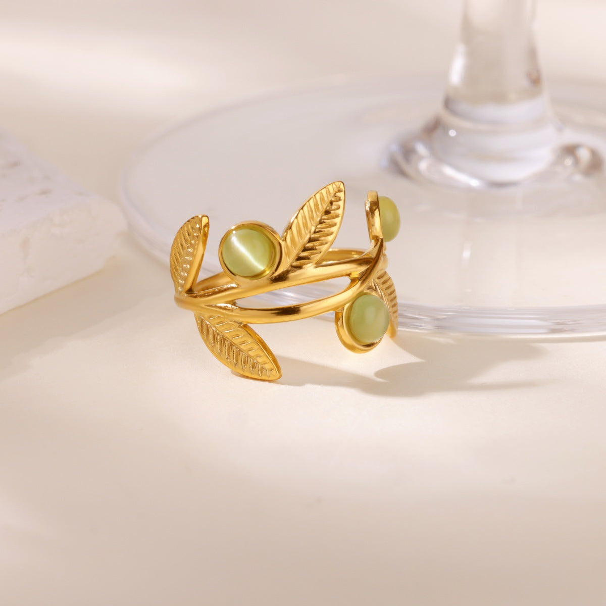 Golden Leaf Adjustable Ring with Green Stone Accents